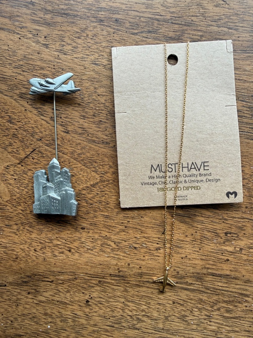 Vintage airplane hat/sweater pin and jet necklace